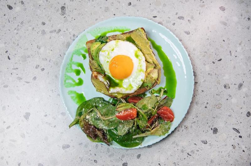 Avocanyon: Brioche bread, mashed avocado, manouri cheese, avocado, fried egg and chive oil
