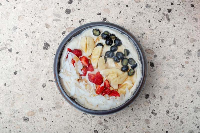 Bowl We Need Is Love: peanut butter, blueberries, banana, strawberries, coconut chips and maple syrup