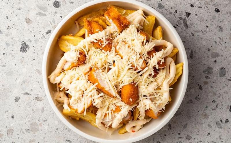 Chicken Meal: Chicken nuggets, fries, sweet chili mayo and kefalotyri cheese
