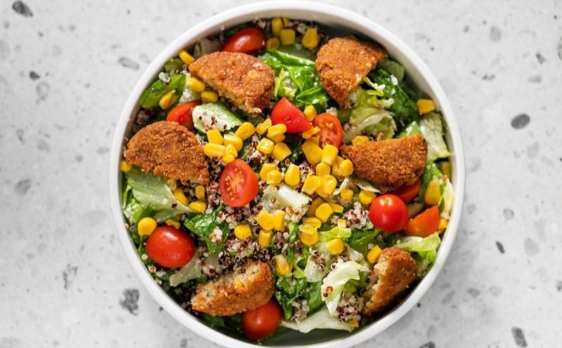 FalaFell In Love: Lettuce, iceberg, falafel, vegan mayo with chives, cherry tomatoes, quinoa and corn