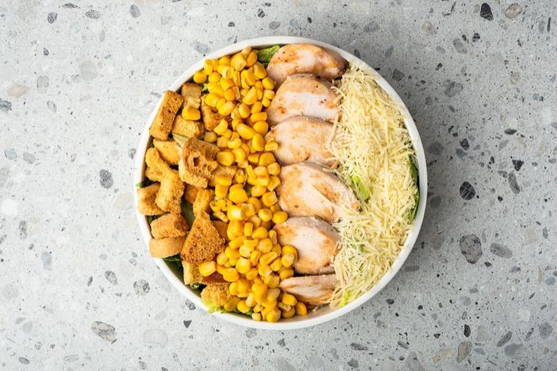 Gallus Gallus: Chicken fillet, lettuce, iceberg, corn, homemade croutons, kefalotiri cheese and mustard sauce