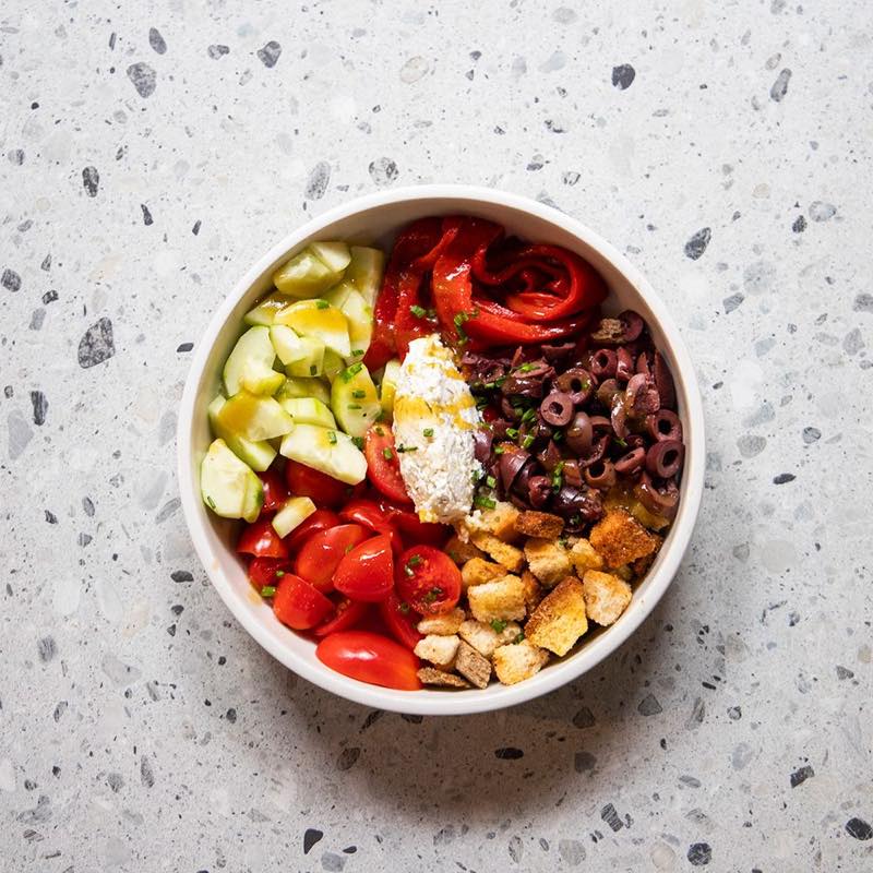 Mediterranean: Cherry tomatoes, feta mousse, cucumber, olives, Florina pepper, chives, balsamic vinaigrette and croutons