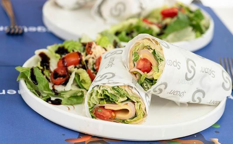 Tortilla el classico: Smoked turkey, cheese, tomato, iceberg lettuce and mustard sauce
